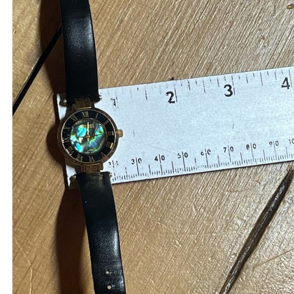 Women's GITANO Gold Tone Abalone Shell Dial Watch, Black Band. Roman numerals - Picture 9 of 9